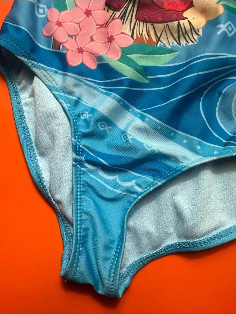 Disney Girls' Blue Swimsuit with Pink Accents and Character Print